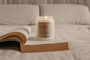 Perfect for book lovers, our Grace + Bloom literary candles are hand-crafted in our sunny shop from natural soy wax with cotton wicks for a clean burn experience, while their modern and minimalist design adds a special touch to any home. With warm, book-inspired scents and a cozy glow, you can create the perfect ambiance for unwinding and curling up with a good book! They also make a thoughtful and sophisticated gift idea for your favorite bookworm.  Light it up for a cozy evening of reading!