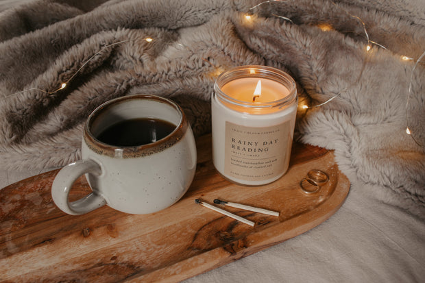 Perfect for book lovers, our Grace + Bloom literary candles are hand-crafted in our sunny shop from natural soy wax with cotton wicks for a clean burn experience, while their modern and minimalist design adds a special touch to any home. With warm, book-inspired scents and a cozy glow, you can create the perfect ambiance for unwinding and curling up with a good book! They also make a thoughtful and sophisticated gift idea for your favorite bookworm.  Light it up for a cozy evening of reading!