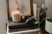 Perfect for book lovers, our Grace + Bloom literary candles are hand-crafted in our sunny shop from natural soy wax with cotton wicks for a clean burn experience, while their modern and minimalist design adds a special touch to any home. With warm, book-inspired scents and a cozy glow, you can create the perfect ambiance for unwinding and curling up with a good book! They also make a thoughtful and sophisticated gift idea for your favorite bookworm.  Light it up for a cozy evening of reading!