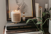 Perfect for book lovers, our Grace + Bloom literary candles are hand-crafted in our sunny shop from natural soy wax with cotton wicks for a clean burn experience, while their modern and minimalist design adds a special touch to any home. With warm, book-inspired scents and a cozy glow, you can create the perfect ambiance for unwinding and curling up with a good book! They also make a thoughtful and sophisticated gift idea for your favorite bookworm.  Light it up for a cozy evening of reading!