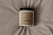 Perfect for book lovers, our Grace + Bloom literary candles are hand-crafted in our sunny shop from natural soy wax with cotton wicks for a clean burn experience, while their modern and minimalist design adds a special touch to any home. With warm, book-inspired scents and a cozy glow, you can create the perfect ambiance for unwinding and curling up with a good book! They also make a thoughtful and sophisticated gift idea for your favorite bookworm.  Light it up for a cozy evening of reading!