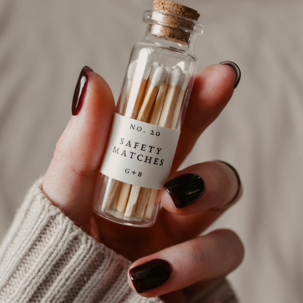 A decorative bottle of matches can be such a cute addition to your decor while keeping them handy for lighting your candles. Grace + Bloom Candle Co white-tipped safety matches are in a cork-topped apothecary vial with a striker pad on the bottom of the bottle.