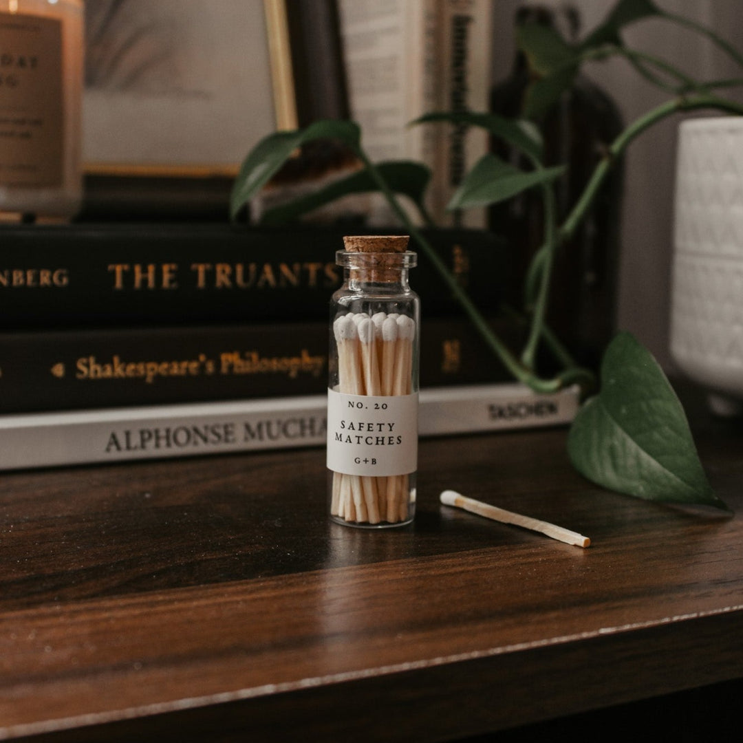 A decorative bottle of matches can be such a cute addition to your decor while keeping them handy for lighting your candles. Corduroy Lane white-tipped safety matches are in a cork-topped apothecary vial with a striker pad on the bottom of the bottle.