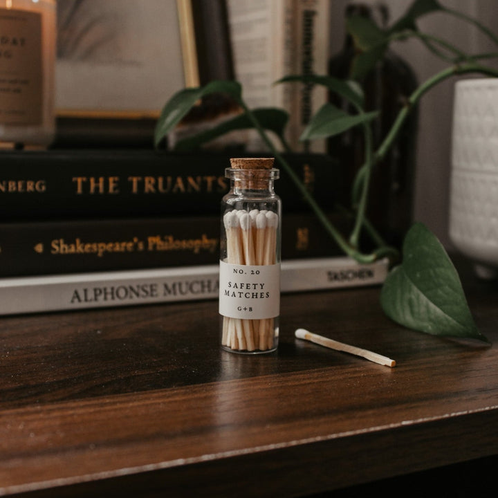 A decorative bottle of matches can be such a cute addition to your decor while keeping them handy for lighting your candles. Corduroy Lane white-tipped safety matches are in a cork-topped apothecary vial with a striker pad on the bottom of the bottle.