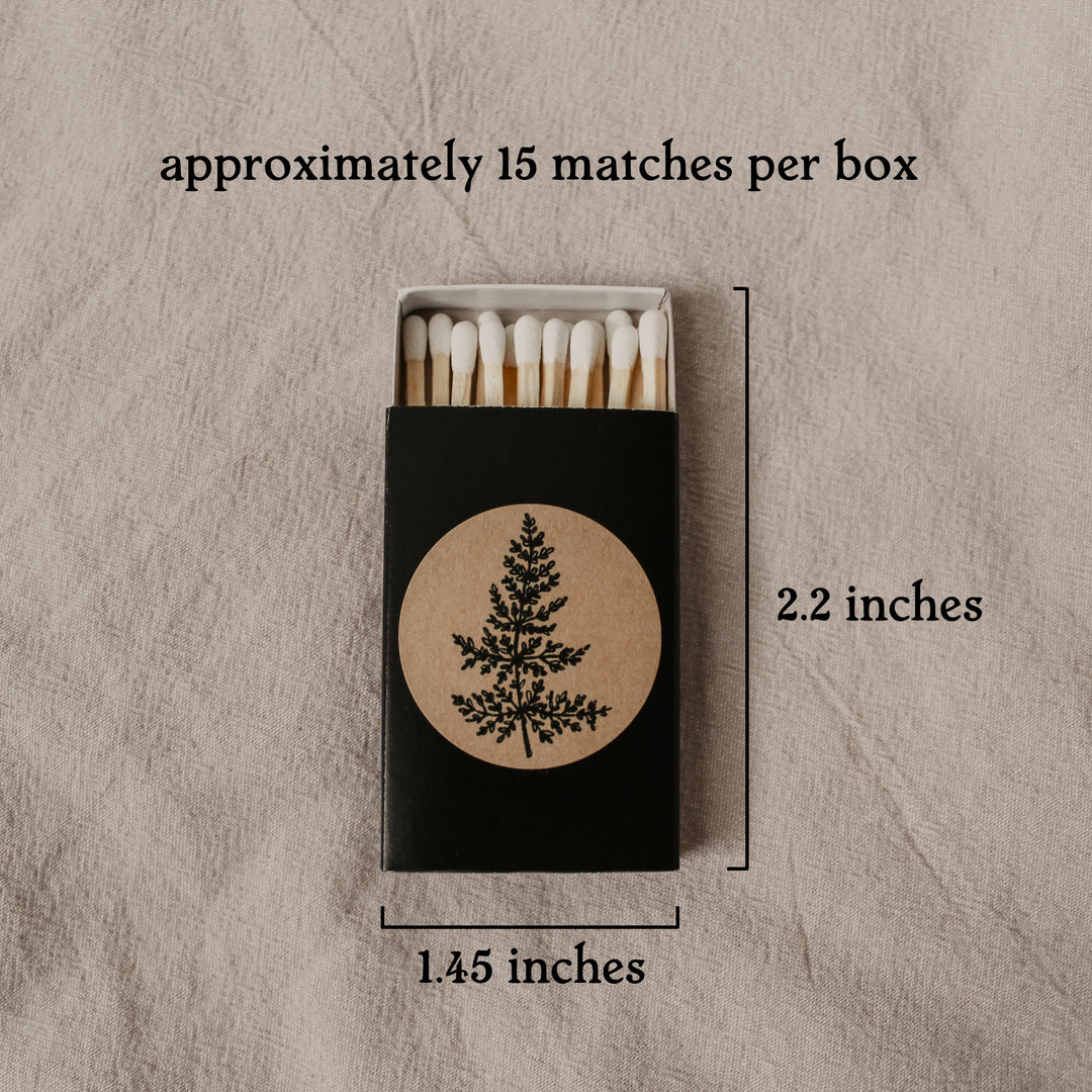 an image of a black matchbox with text describing the dimensions and number of matches inside