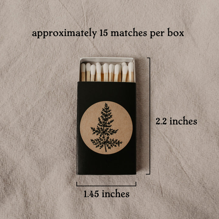 an image of a black matchbox with text describing the dimensions and number of matches inside